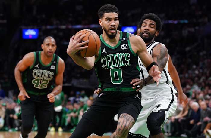 Boston Celtics forward Jayson Tatum, Al Horford; Brooklyn Nets guard Kyrie Irving
